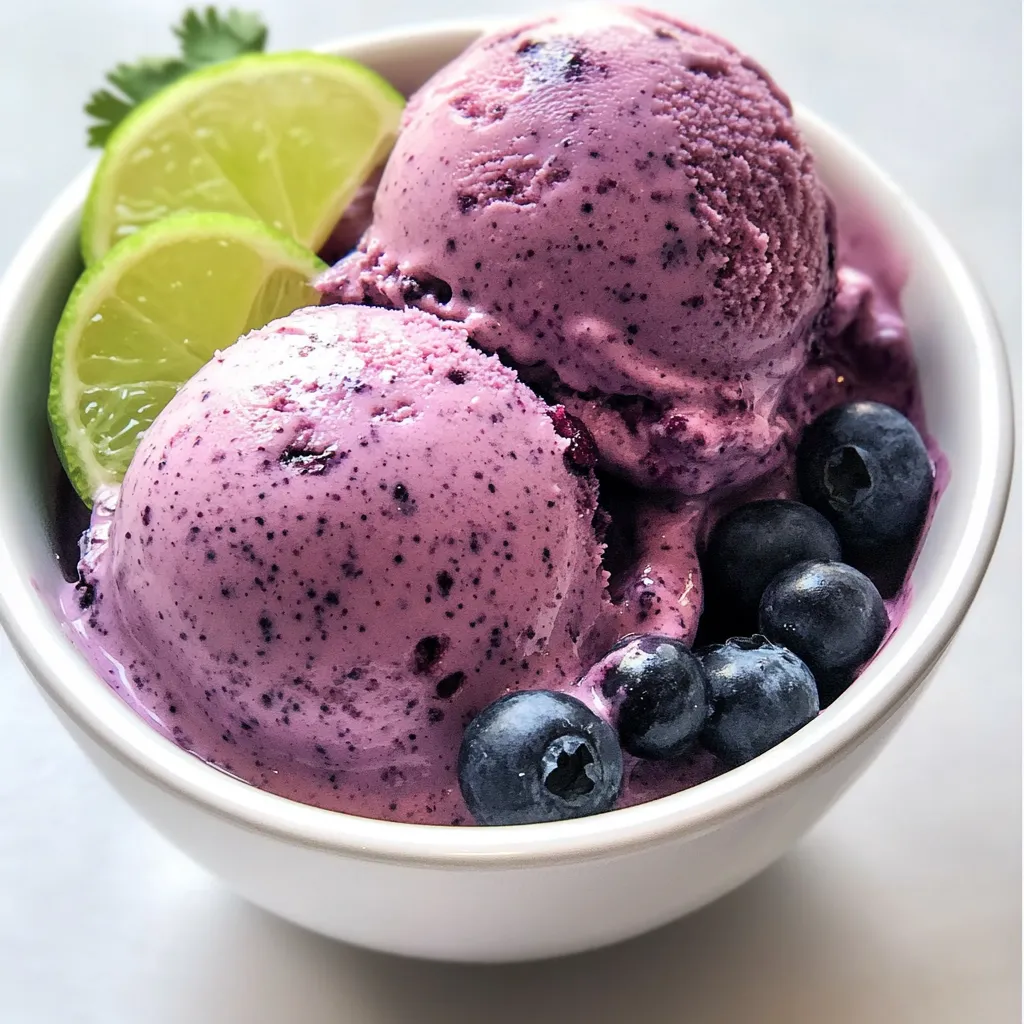 Bowl of blueberries and lime.