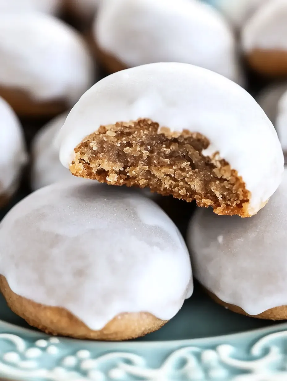 A plate of cookies with a bite taken out of one.