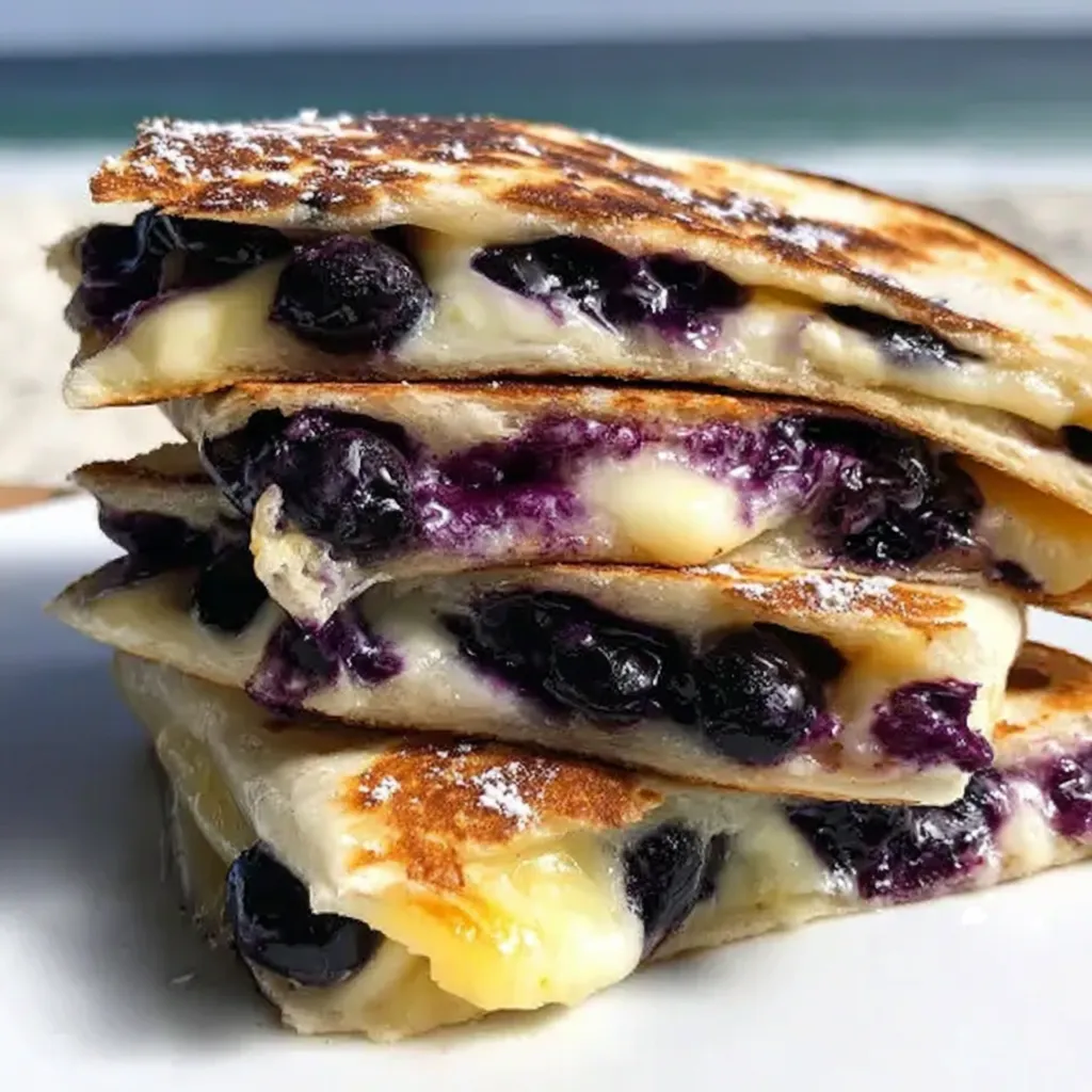 A stack of blueberry pancakes.