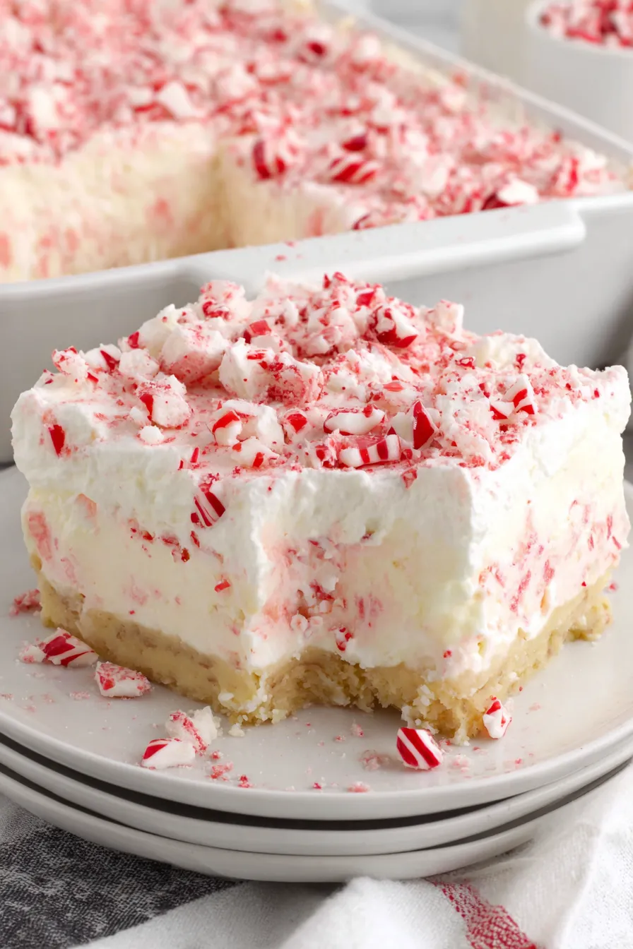 A slice of cake with red and white stripes.