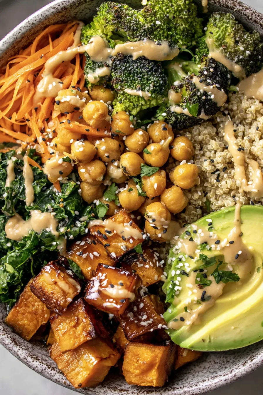 A plate of food with chicken, rice, and vegetables.